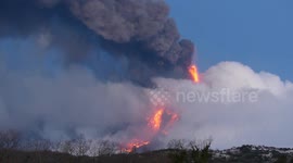 Mount Etna erupts spectacularly spewing lava into night sky