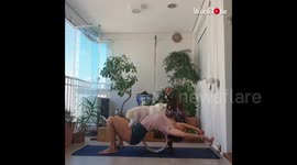 This cat loves nothing more than joining in with his owner's yoga sessions