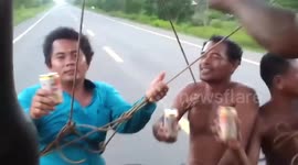 Passengers spotted using ropes as seatbelts on bus in Cambodia