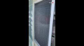 'Ice Storm in Ocean Shores Forms 'Ice Sheet' on Window'