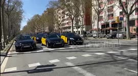 Barcelona taxis perform 'slow march' in protest against Uber's return to city