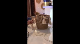 Watch as Turkish woman repurposes bucket into handy flower pot