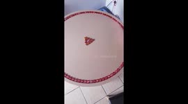 'DIY Beer Bottle Cap Table - Placing Caps on the Wooden Table's Surface'