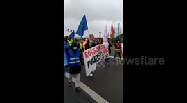 Aviation workers protest outside Paris airport after job cuts announcement