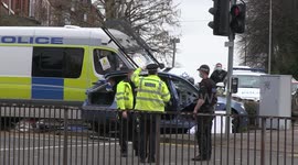 UK police van responding to emergency plows through Leicester red light and into car resulting in serious inuries
