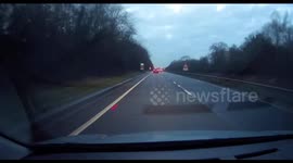 BMW Undertaking a car approaching a roundabout caught on dashcam