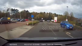 Car pulls out on a roundabout in a Tesco car park (UK Dash Cam Footage)