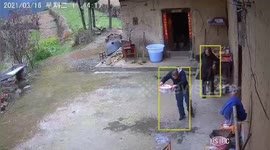 Tile narrowly misses man after falling off house roof in southern China