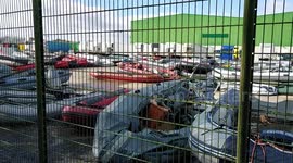 Illegal migrant boat/dinghy storage facility where they are all stored.