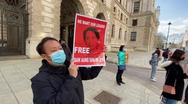 Small number of protesters stage 'silent strike' outside UK Foreign Office