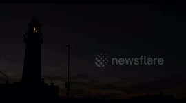 Flamborough Lighthouse Sunrise Timelapse 4K - Light cloud cover and blue skys.