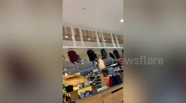 Japan earthquake shakes shopping mall clothing displays