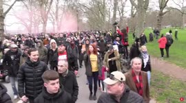 Anti-lockdown protest, Hyde Park, London flares lit Saturday March 20
