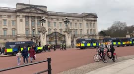 Police vans line up in front of Buckingham palace amongst lockdown protest in londkn