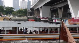 Bangkok's Chao Phraya River has diverse traffic despite Covid pandemic.