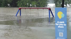 Severe flooding of Australian river sees nearby park and pathways submerged
