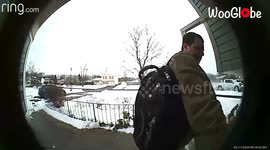 'Man with Laptop Slips on Icy Pavement (Hilarious)'