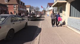 Crowds of people out enjoying the first warm spring weekend on Main street Unionville near Toronto but the COVID 19 pandemic is far from over in Ontario Canada