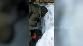 Officials in India's Jammu and Kashmir rescue truck driver trapped in snow