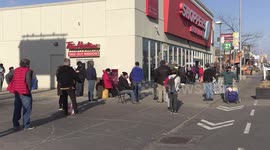 Older people line up at drug store in Toronto for the Astra Zeneca COVID 19 vaccine