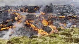 SOUND ON! Listen as lava from Iceland volcano slowly engulfs surrounding greenery