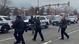 Armed police arrive at scene of  Colorado grocery store shooting as sirens blare
