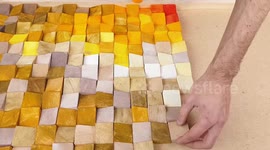 YouTuber films as he creates his own mosaic from wood