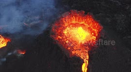 Mesmerizing aerial footage of Iceland volcano shows river of lava