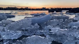 Sunrise over the thawing ice of Lake Erie as the last of winter's ice finally melts on the Upper Niagara