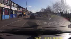 Driver pulls out, flicks a cigarette at my car then nearly hits another car.