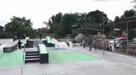 Food delivery cyclist does bike tricks at a skatepark in the Philippines