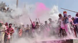 Riot of colour as Indians celebrate Holi Festival in sacred city of Varanasi