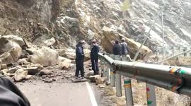 Locals watch on helplessly as landslide blocks road in northeastern India