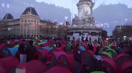 Protesters set up migrant camp in Paris to demand better housing