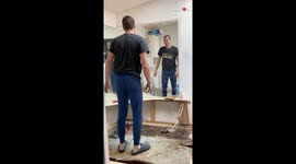'Guy Kicks Glass Mirror and Cuts his Foot'