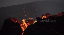 Magma erupts from Geldingadalir volcano cone, close up, Iceland March 2021