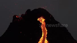 Magma spewing under lava arch at Geldingadalir volcano Iceland, March 2021