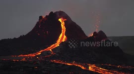Rivers of magma flow from Geldingadalir volcano cone, Iceland March 2021