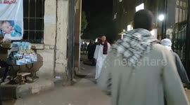 Locals gather in front of hospital where injured from Egypt train crash receive treatment