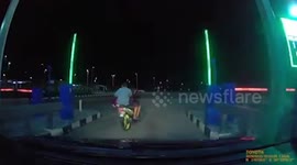 What the?! Sneaky motorcyclist steals driver's toll gate access in Malaysia