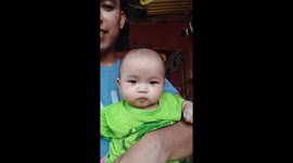 Our Cute Neighbor , Trying to get the Cellphone from the Owner.