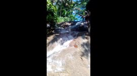 Little dunn's river flowing and meeting with the caribbean ocean in ocho rios jamaica beautiful sunny moring