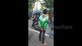 Police Save Suicide Bomb Victims in Front of the Makassar City Cathedral Church