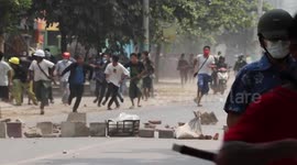 Myanmar protesters clash with soldiers as more than 100 people are killed