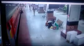 Passenger dragged by train is saved