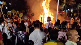 The people's gather around a bonfire and pray and perform rituals Holika Dahan