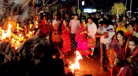 Indian women gather at bonfires to pray and perform rituals for Holika Dahan