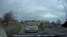 UK driver captures moment fleeing motorcyclist is apprehended by police