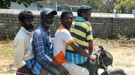 4 people were seen riding on a two wheeler in a state highway caught on camera in South India.