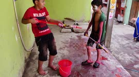 The small children's played Holi with funny smily moment in India